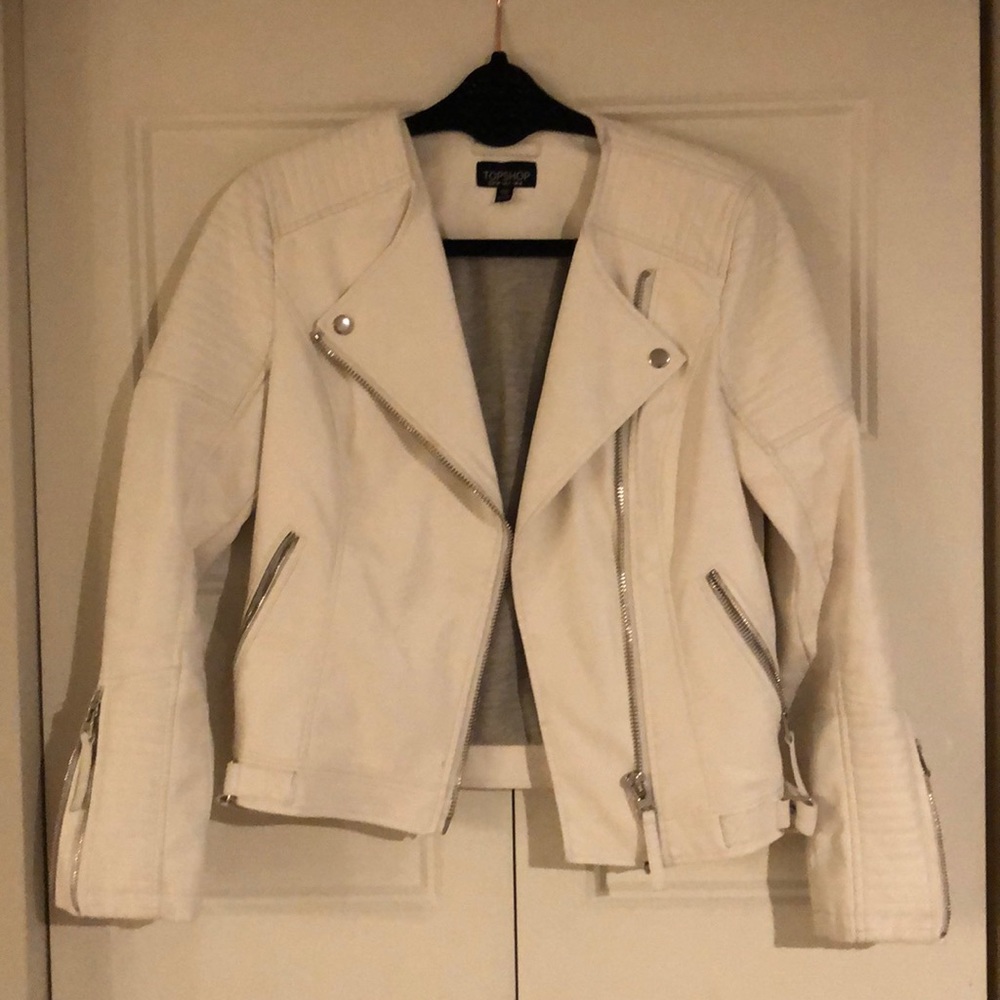 White moto jacket with silver hardware accents